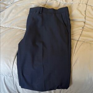 Men's Haggar navy blue dress pants. Excellent condition size 36 with 30 inseam.